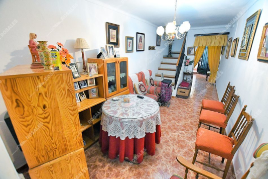 Casa en pleno recorrido procesional